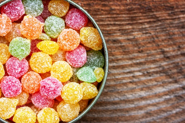 colorful multicolored sucking sweets montpensier lollipops in a round tin - Пасха царская