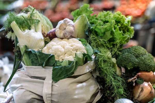 display of fresh ripe organic broccoli salad with greens and vegetables in cotton bag at the weekend farmer s market - Салат "Южный"