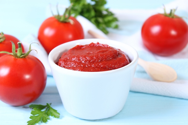 tomato paste on the table top view tomato sauce - Постная тушёная свёкла с квашеной капустой