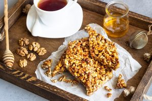 Козинаки dessert bars made of walnuts in a honey caramel - Козинаки