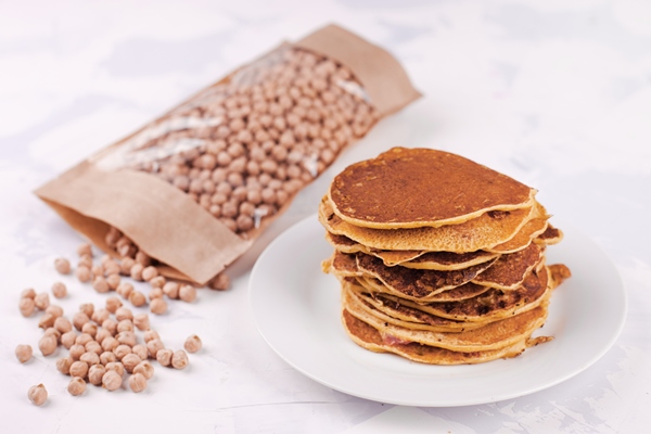 pancakes or fritters of chickpeas flour vegetarian snack 1 - Оладьи с нутовой мукой