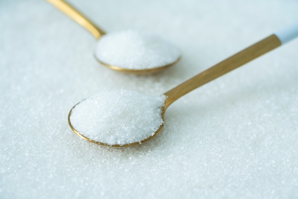 spoon with sugar on a white background - Итальянский рождественский пирог "Панфорте"