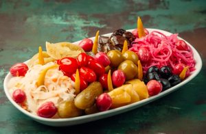 wide selection marinated fruits vegetables white plate - Основы сухоядения