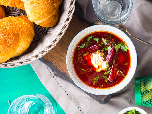 beetroot soup served in bowls on napkin - Бульон "борщок"