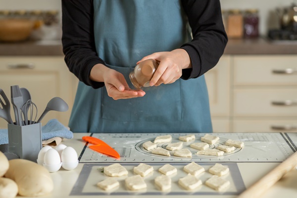 cooking central asian baursaks by a chef in a modern kitchen - Баурсаки