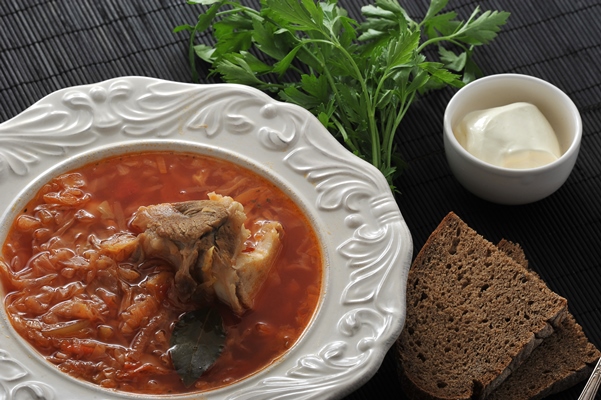 traditional russian soup borsch with cabbage sour cream - Щи из свежей капусты с картофелем