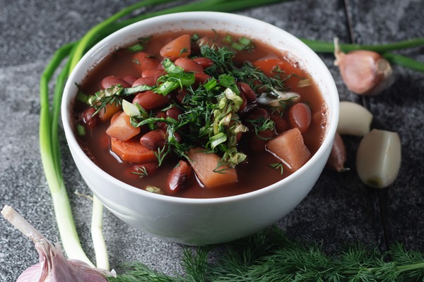 bean soup with herbs in a white bowl 2 - Суп из красной фасоли по-монастырски