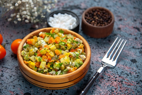 Картофельный салат по-монастырски front close view vegetable salad with seasonings on blue background - Картофельный салат по-монастырски