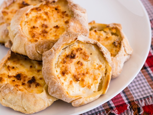 Пирожки «Калицунья» ready to eat pastries appetizing cheesecake with cottage cheese on a plate 1 - Пирожки «Калицунья»