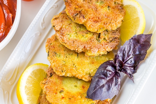 vegetarian burgers with sauce and vegetable selective focus - Чечевично-рисовые оладьи, постный стол