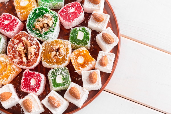 turkish delight on a wooden table - width=