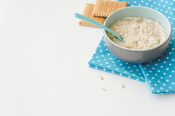 copy space bowl with cereals biscuits - Овсяная каша с кешью