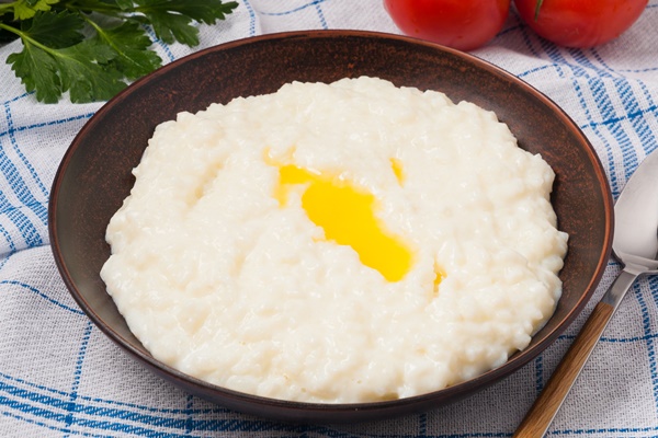 Рисовая каша на воде rice porridge with milk poured with butter - Рисовая каша на воде