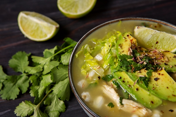 Треска-пашот в кокосовом молоке с овощами top view appetizing pozole bowl - Треска-пашот в кокосовом молоке с овощами