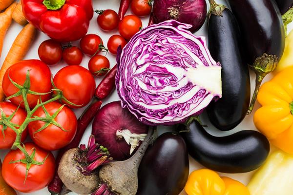 flat lay colourful assortment vegetables - Как уменьшить содержание нитратов в овощах