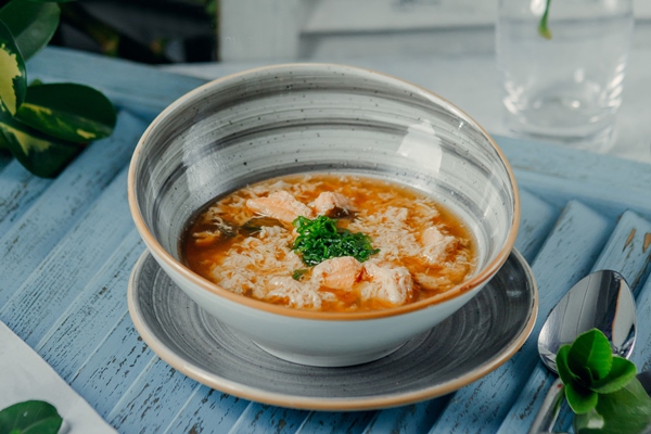 bowl hot soup with diced green onion modern bowl - Калья