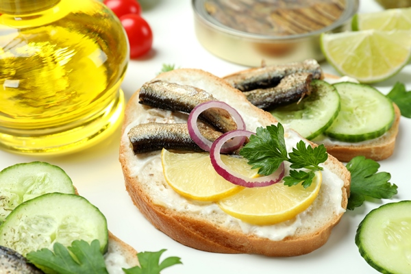 concept tasty snack with sandwiches with sprats white background - Бутерброды со шпротами