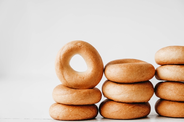 drying mini round bagels white wooden background top view copy empty space - Сушки "Любимые"