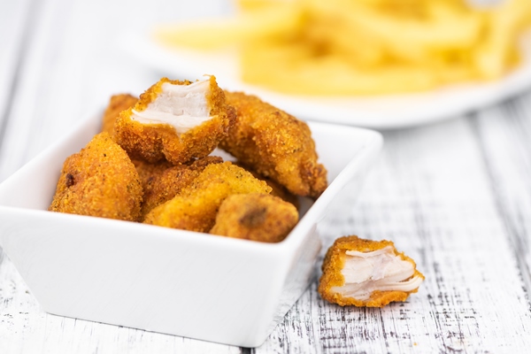 homemade chicken nuggets vintage background - Домашние наггетсы
