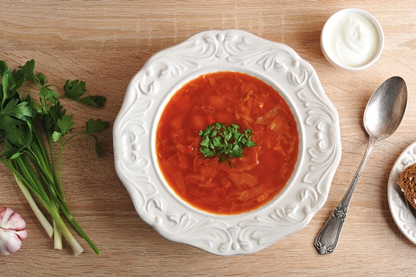 Борщ "Дивской" по-дивногорски soup bowl with dill sour cream black bread wooden surface - Борщ "Дивской" по-дивногорски