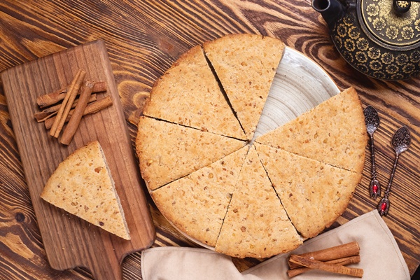 Слоёные блины по-марийски wallnut cake nuts cinnamon pot tea side view 1 - Слоёные блины по-марийски