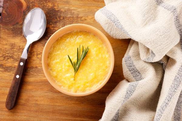 polenta ceramic bowl rustic wooden table cream corn mamaliga - Кукурузная постная каша с мёдом