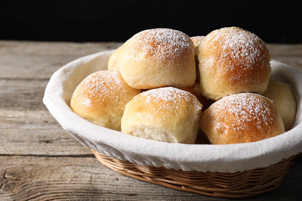 Постные булочки с тыквой delicious dough balls basket wooden table closeup - Постные булочки с тыквой