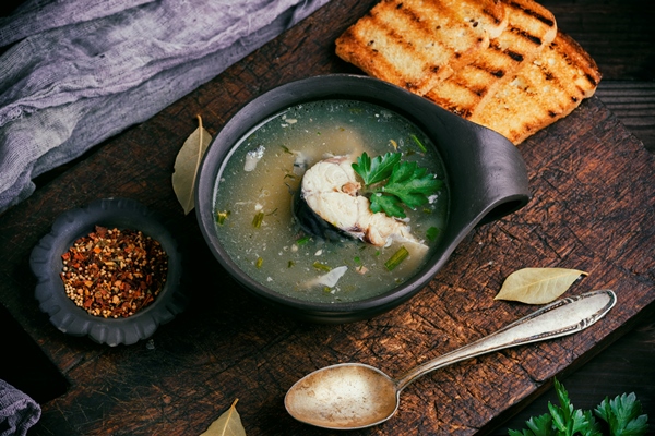 fish soup with mackerel brown clay plate - Щерба казачья со сливочным маслом