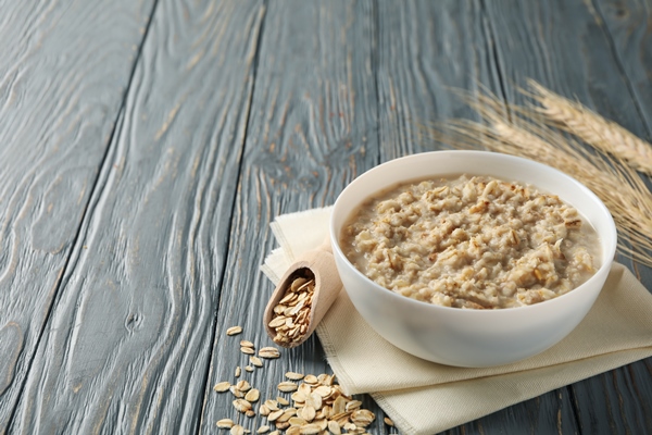 Постная простая овсяная каша на воде composition with oatmeal porridge wooden cooking breakfast - Постная простая овсяная каша на воде