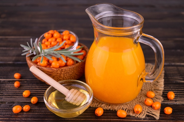 Облепиховый морс с пряностями decanter with vitamin sea buckthorn juice honey berries hazelnut - Облепиховый морс с пряностями