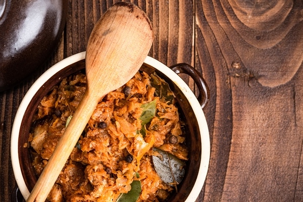 Бигос по-польски hunter stew bigos polish traditional sauerkraut and cabbage dish - Бигос по-польски