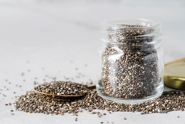 Чиа jar filled with organic seeds - Чиа